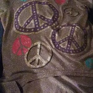 A sparkle peace sign shirt